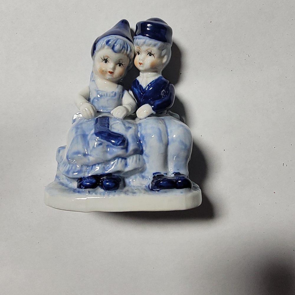 Vintage Delft Blue and white ceramic boy and girl